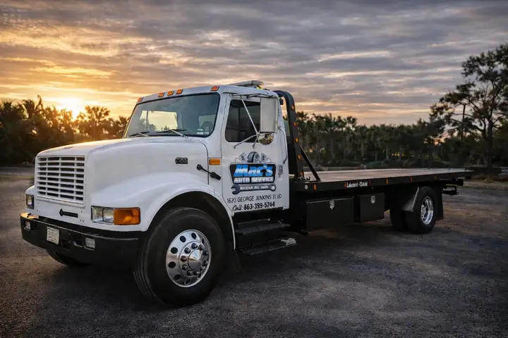 Bertha, Mac's Auto Repair and Towing in-house flatbed tow truck in Lakeland, FL